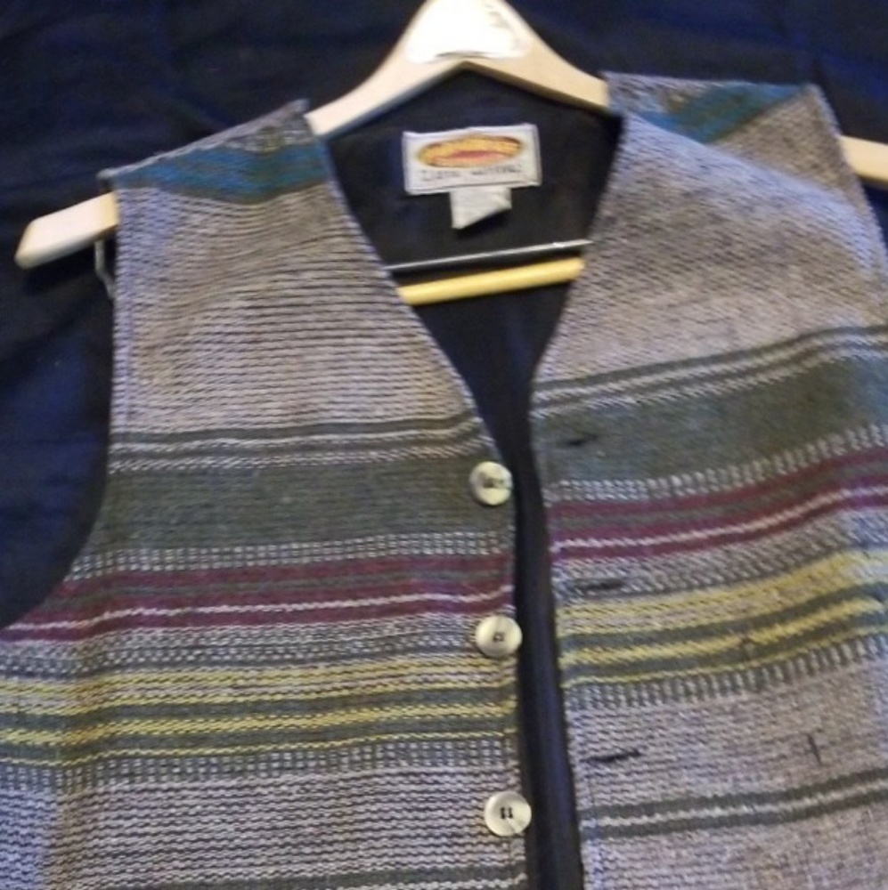 Rustic vest no major wear, no stains or holes.